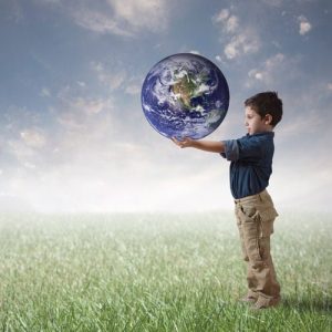 Child holding the world